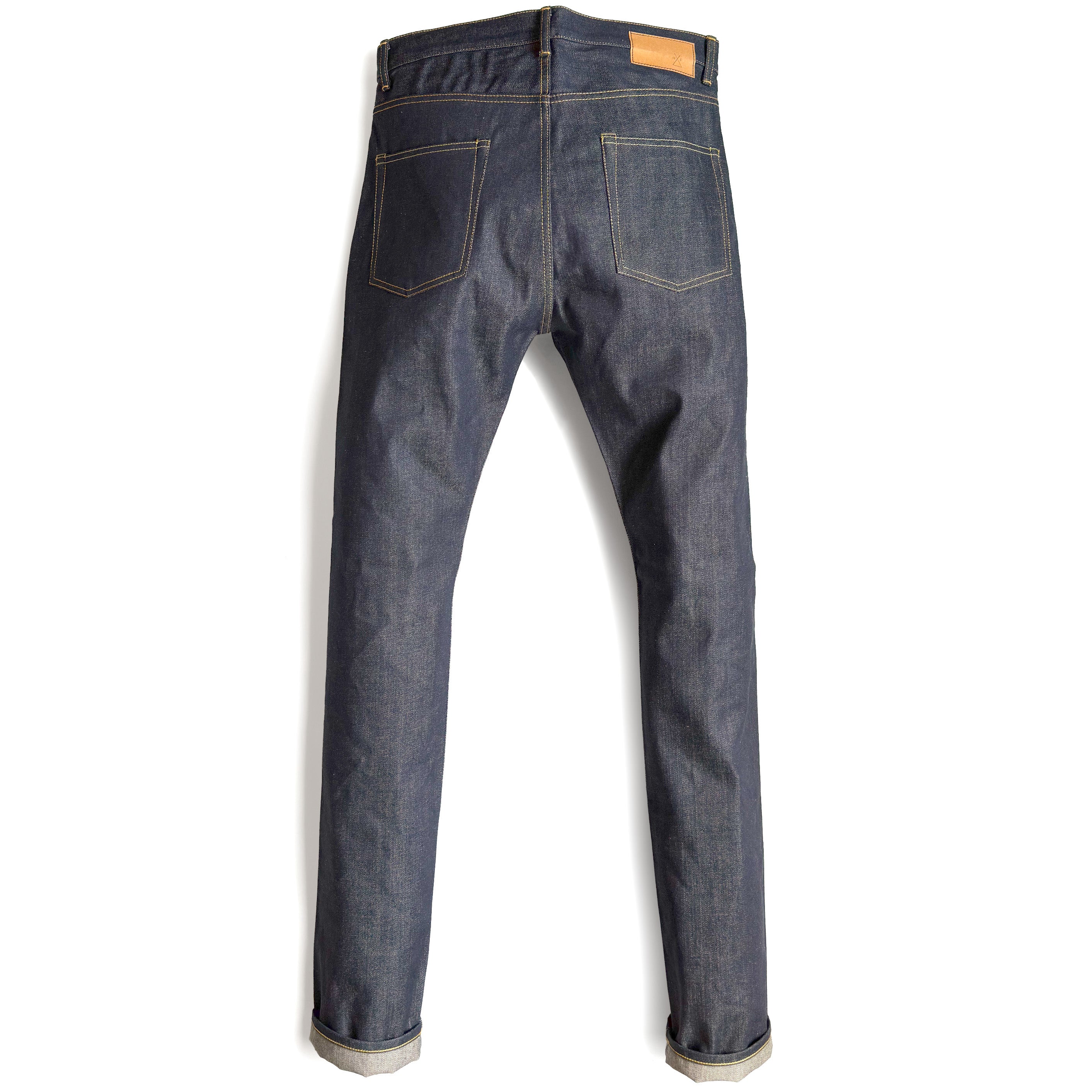HFD02 Japanese selvedge denim relaxed fit tight tapered leg jeans, back view showing rear pockets and jacron paper patch.